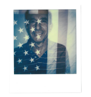 THE Democrat. (Andy Tobias, Treasurer of the DNC + an American flag)